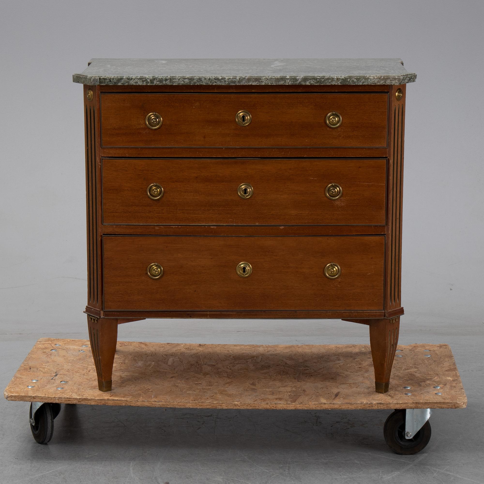 A gustavian style chest of drawers from the second half of the 20th century.