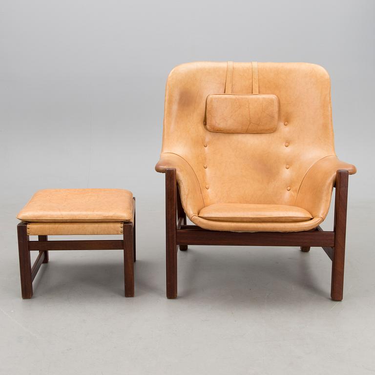 A 1960s 'Caravelle' armchair and ottoman for Puunveisto Oy - Träsnideri Ab, Finland.