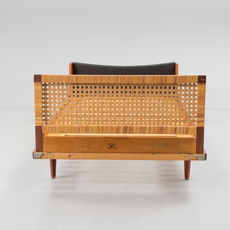 A bed by Hans J. Wegner, Getama, Denmark.