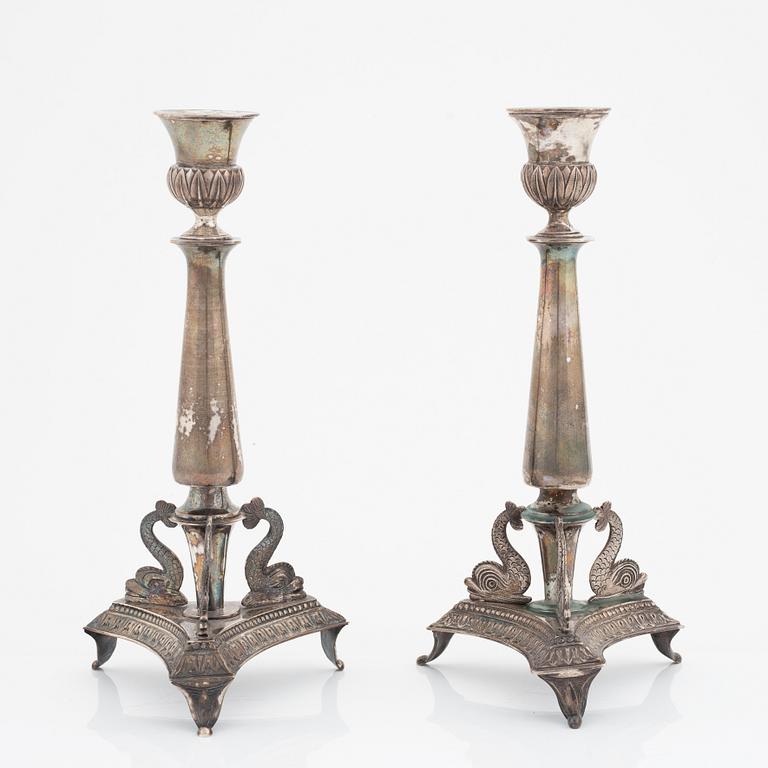 A pair of silver empire candlesticks, one with mark of Adolf Zethelius, Stockholm 1819.