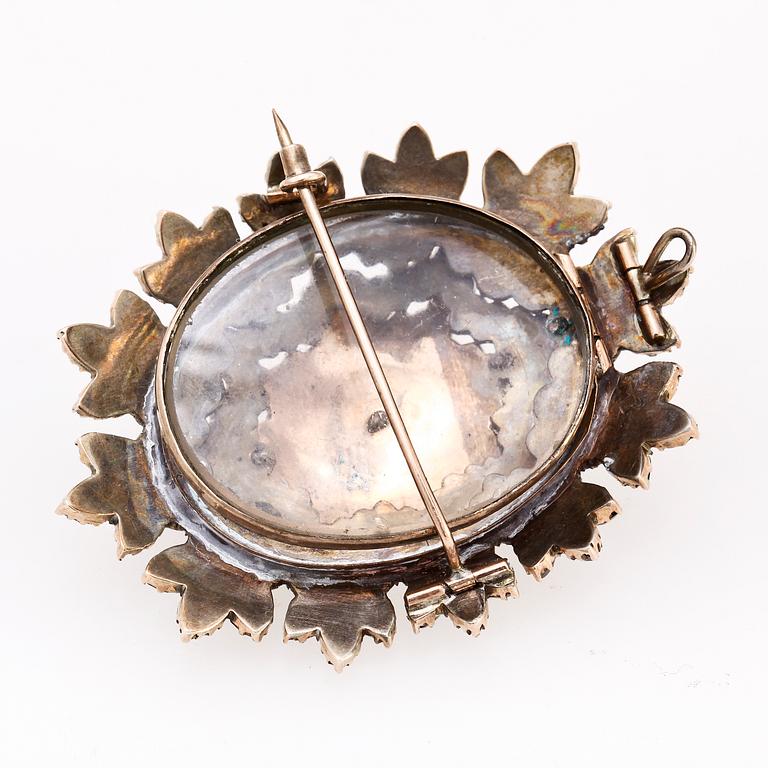 COLLIER samt BROSCH, granater och silver. 1900-talets början.