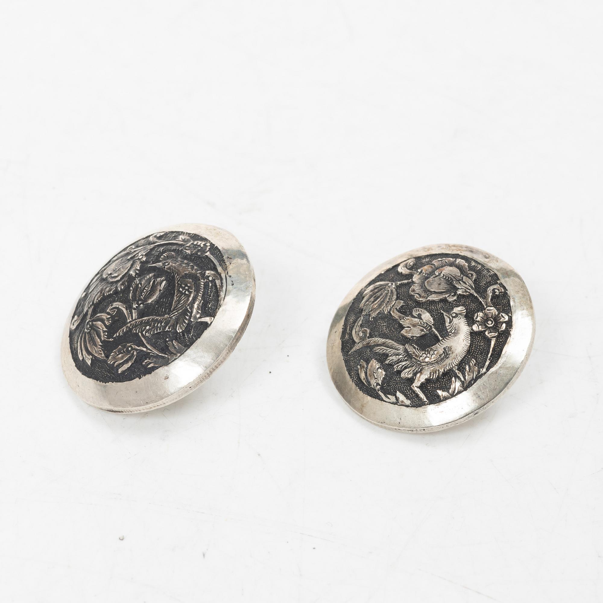 Two silver buttons, a belt buckle, an armring and a box, Persia, first part of the 1900s.