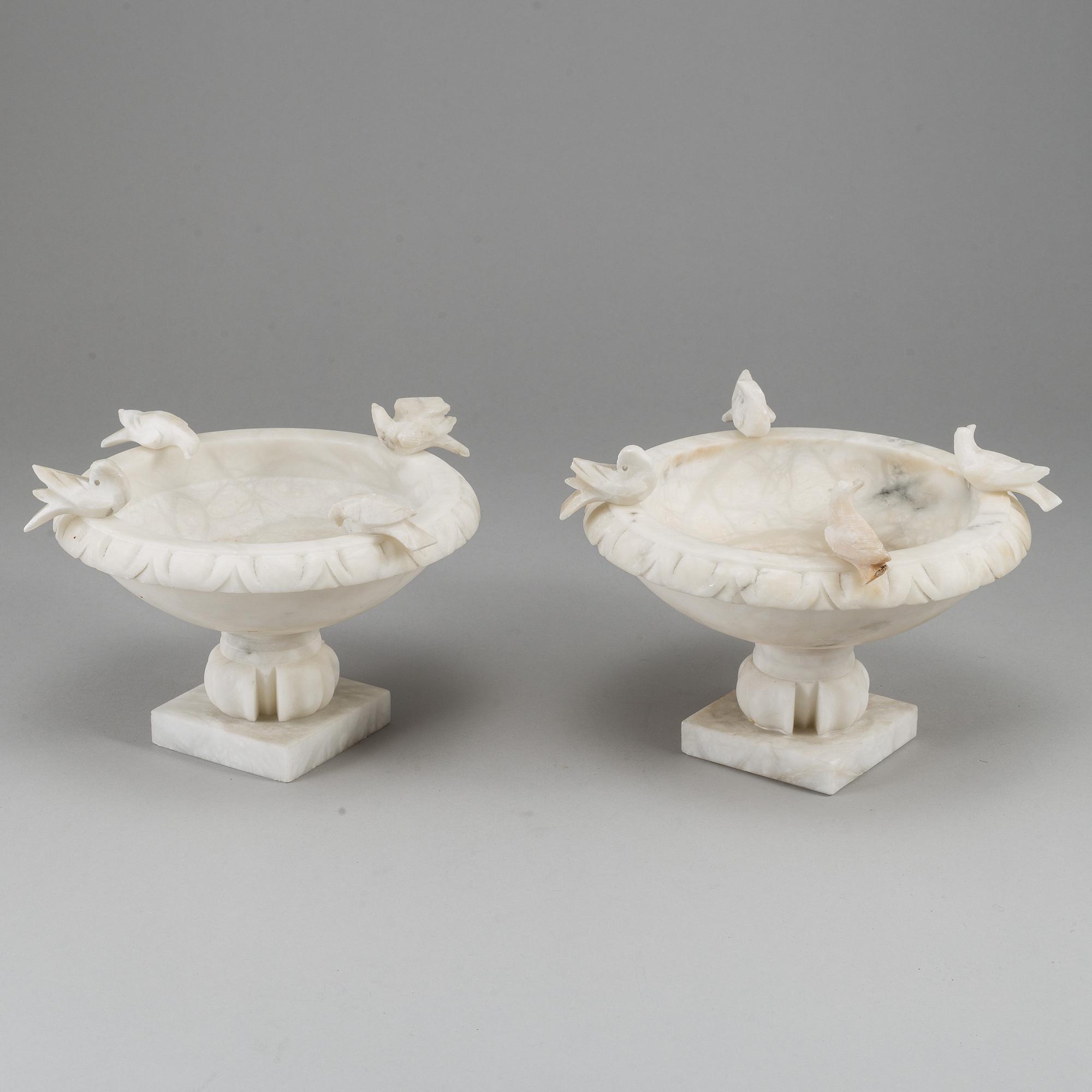 A pair of 20th century alabaster bowls or birdbaths.