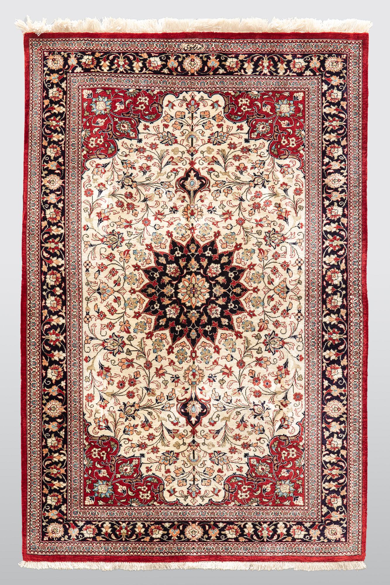 A carpet, Silk Qum, ca 116 x 75 cm.