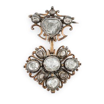 583. A  14K gold and silver brooch with rose-cut diamonds, 19th century.