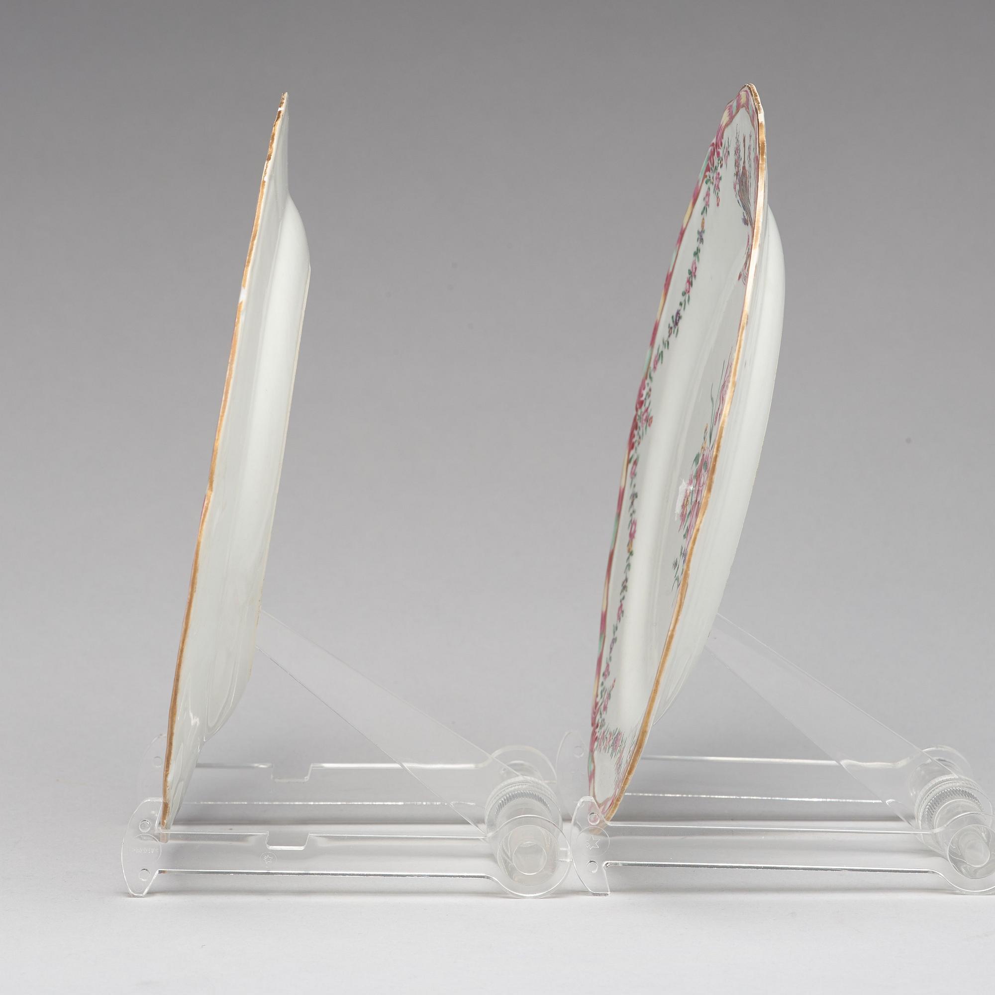 A pair of armorial famille rose plates, Qing dynasty, Qianlong (1736-95).