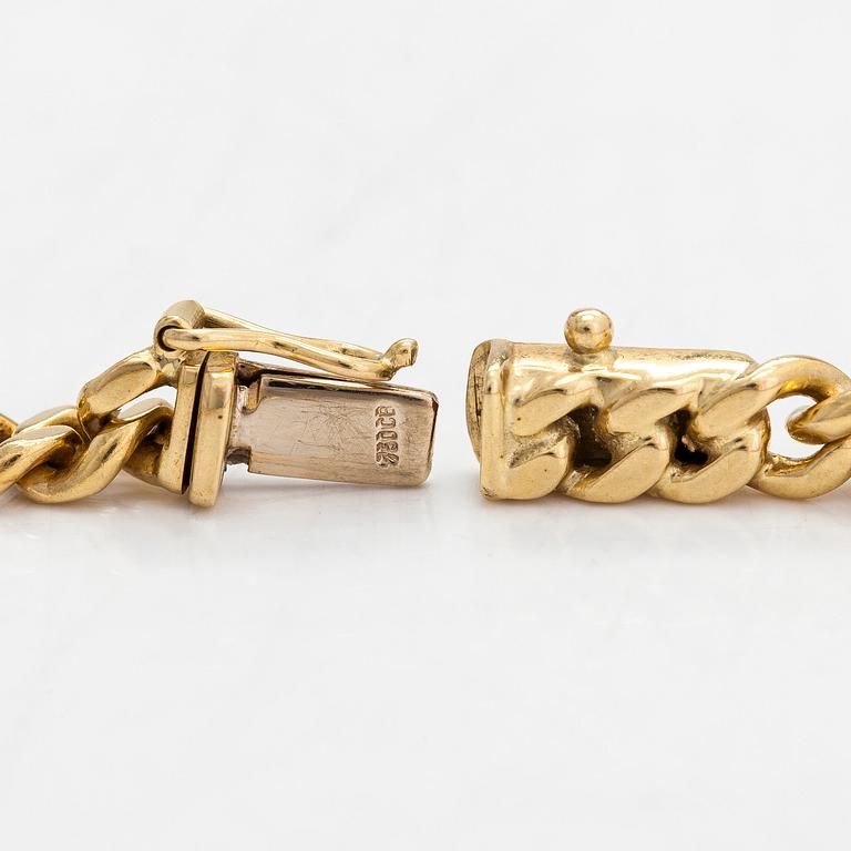 Halsband, pansarlänk, 18K guld med cabochonslipade rubiner, safirer och smaragd.