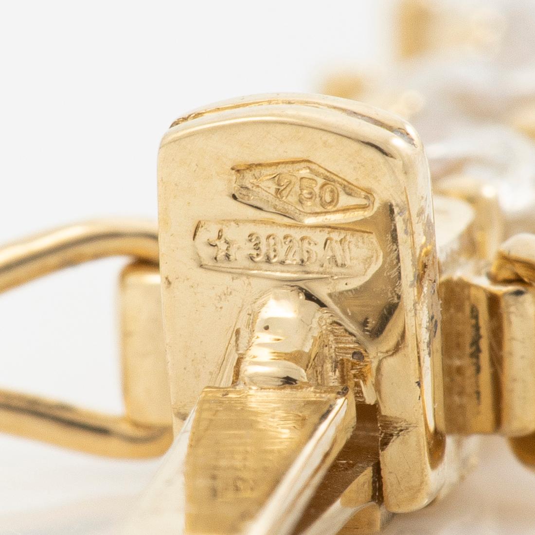 Tennis bracelet in 18K gold with brilliant-cut diamonds.