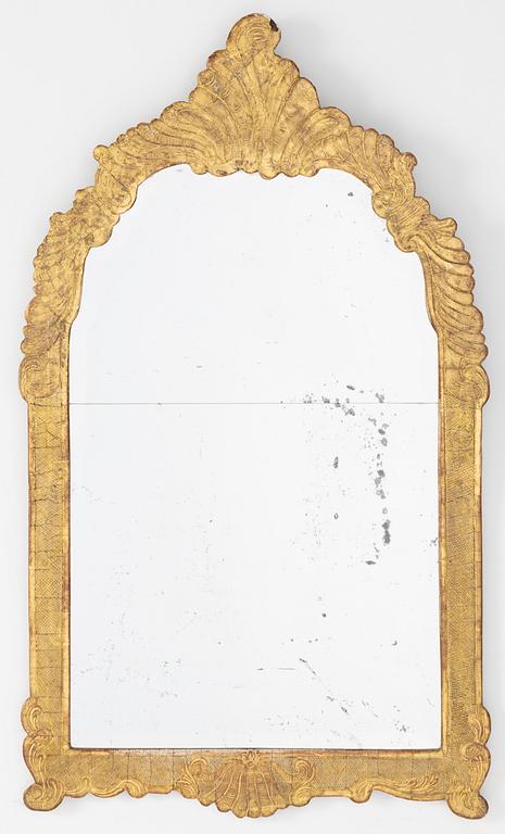 A rococo mirror, mid 18th Century.