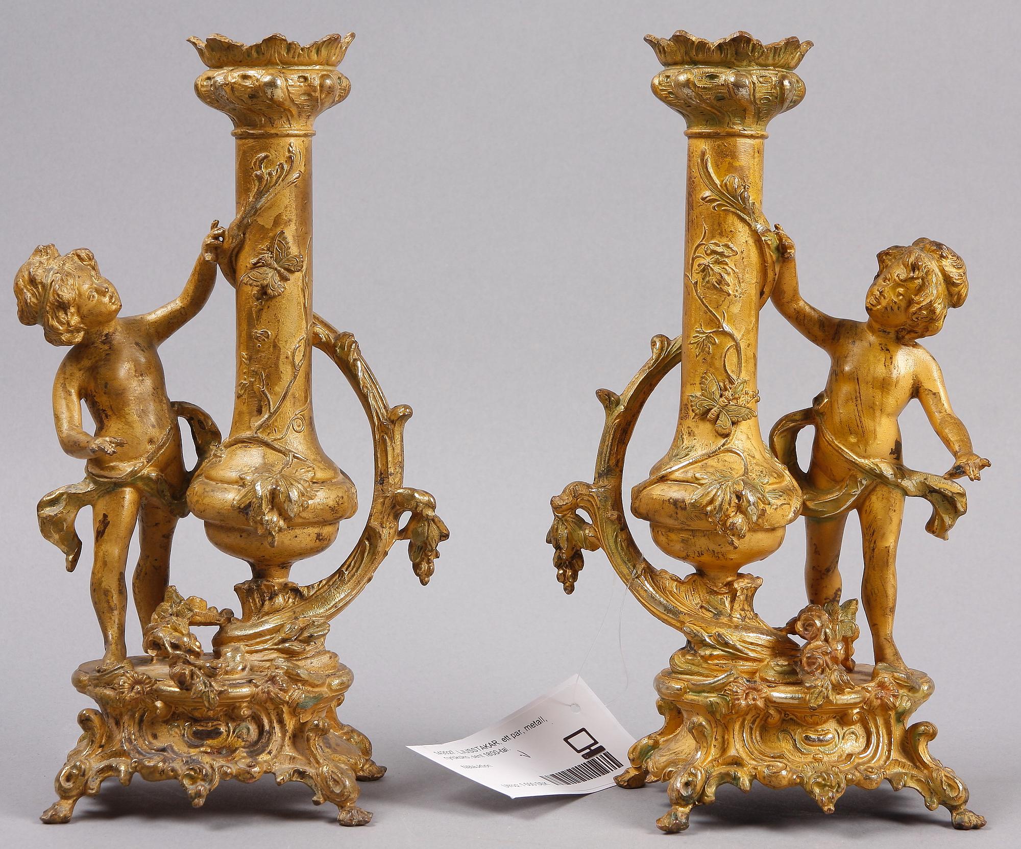 LJUSSTAKAR, ett par, metall, nyrokoko, sent 1800-tal.
