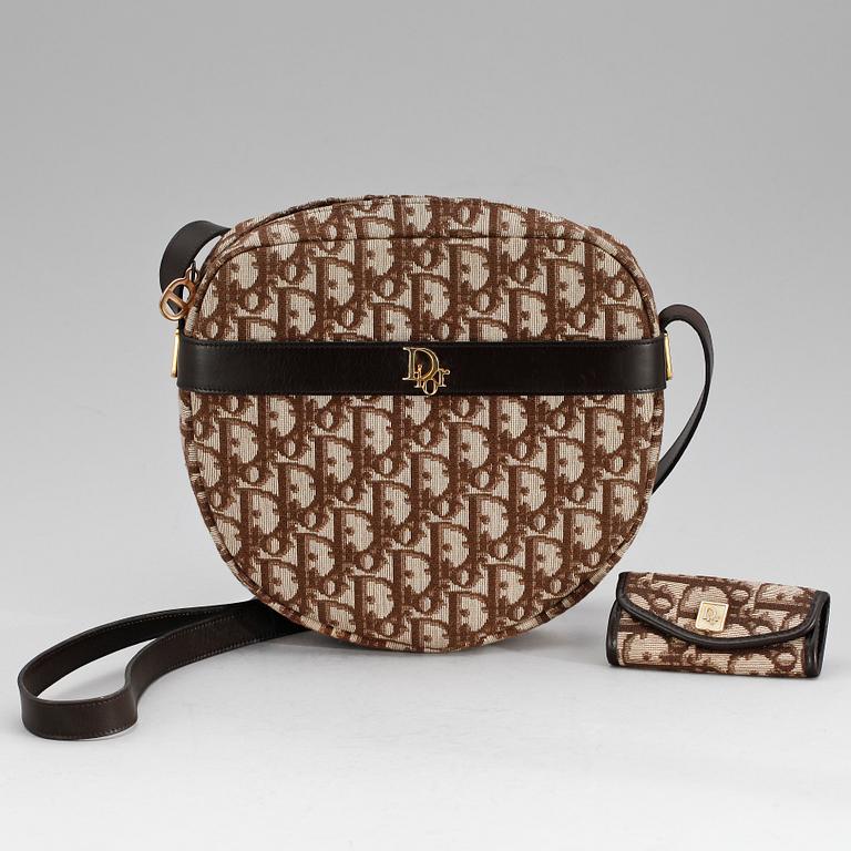A brown monogram canvas handbag and keyholder by Christian Dior.