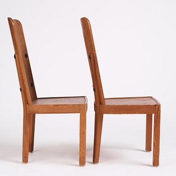 Axel Einar Hjorth, a pair of stained pine 'Lovö' chairs, Nordiska Kompaniet, Sweden 1930s.