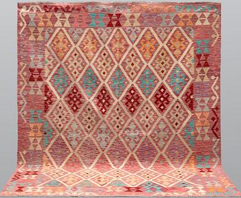 A Kelim carpet, c. 240 x 175 cm.