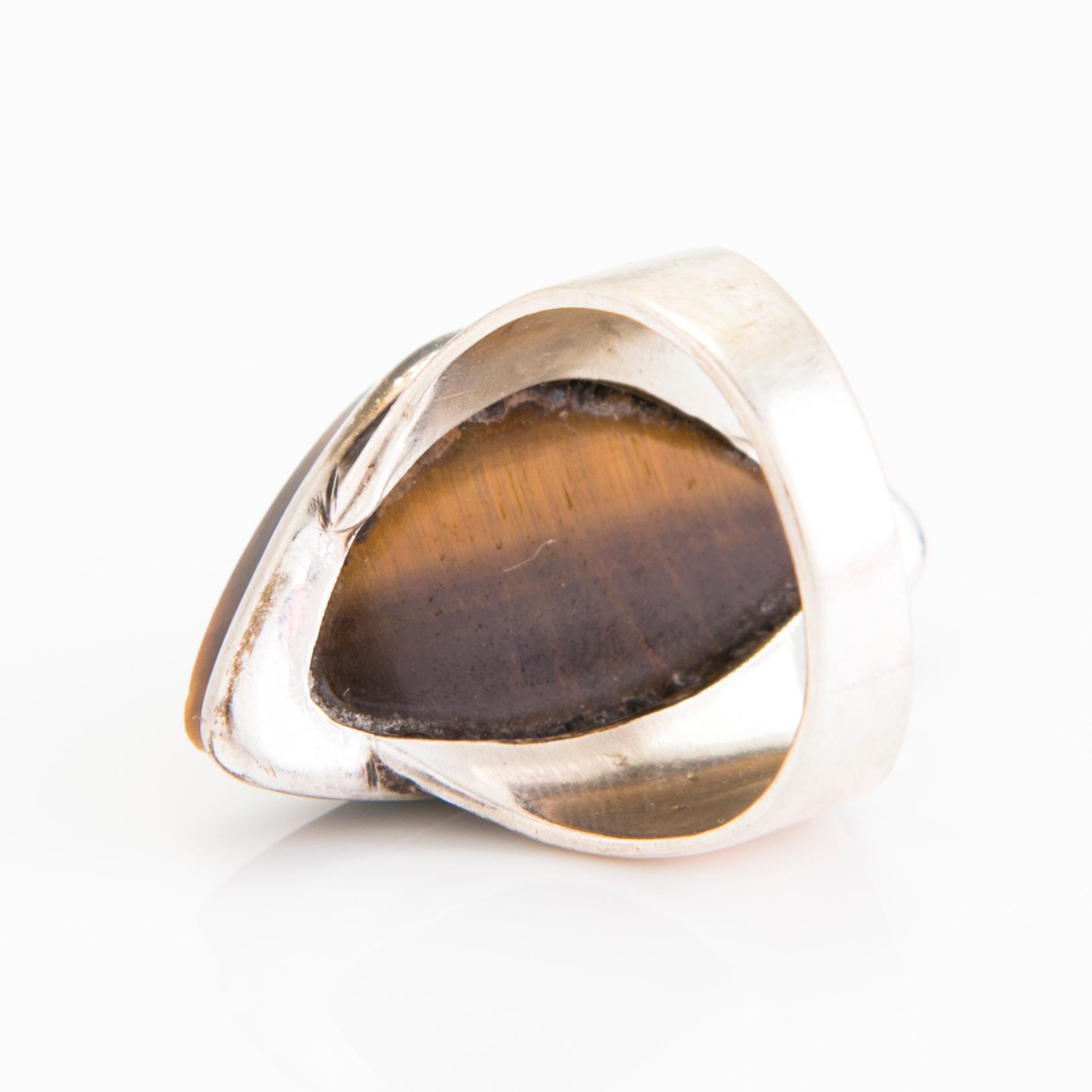 RIIPUS ja SORMUS, hopeaa, tiikerinsilmä, 1961.