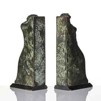 Axel Gute, a pair of Swedish Grace patinated bronze bookends, 1920s.