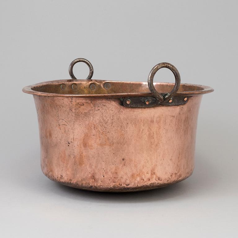 A 19th century copper cauldron.