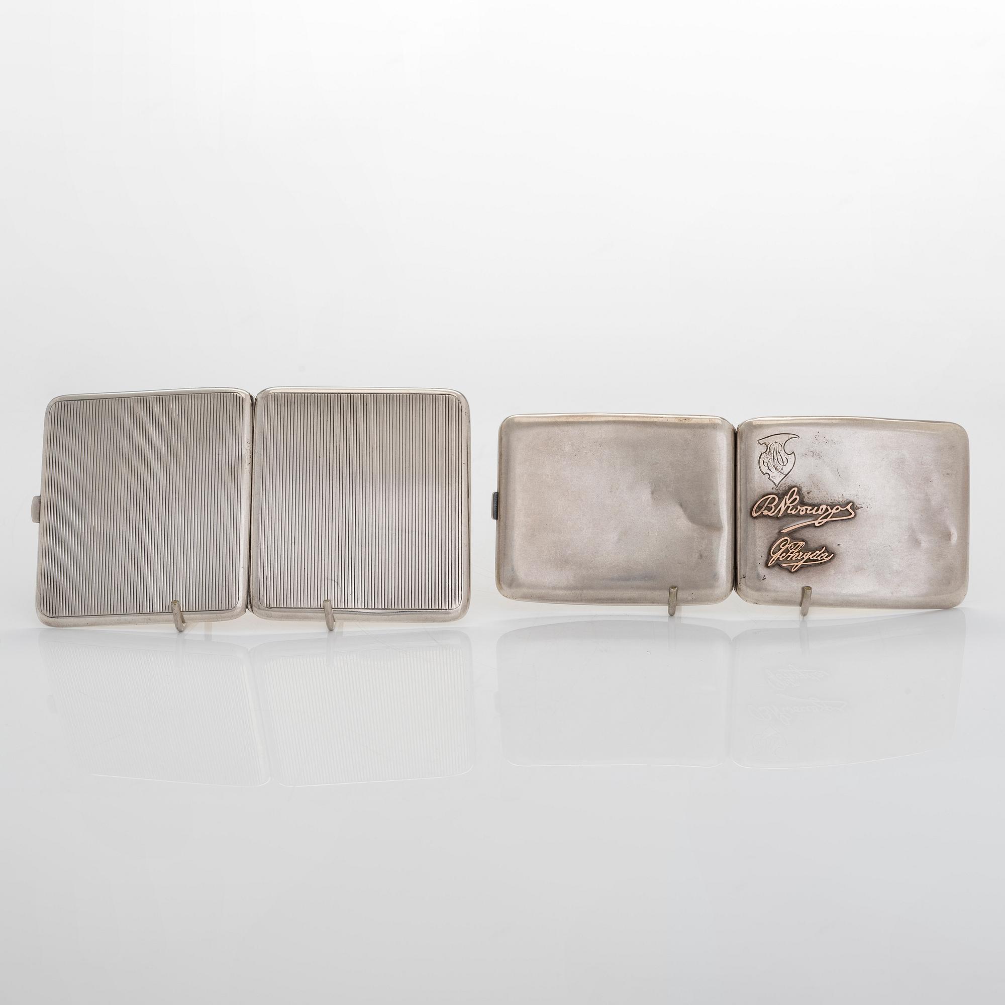 Two silver cigarette cases, J. H. Werner, Berlin, 1922, and Huguenin Frères, Switzerland before 1933.
