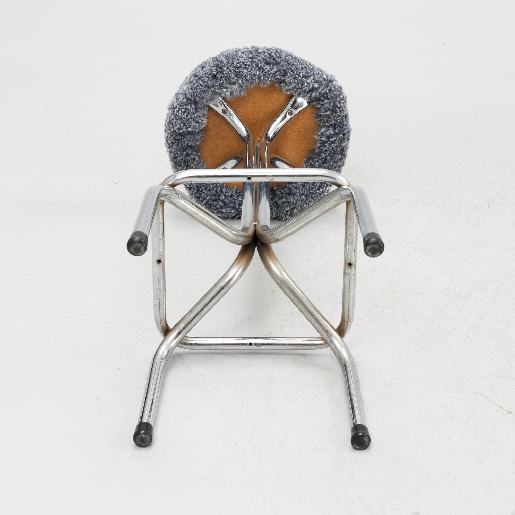 A set of four bar stools, mid 20th Century.