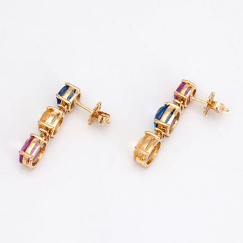 A pair of blue, yellow and pink sapphire and diamond earings.