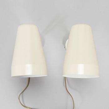 A pair of 1960s wall lights model AH 74, for Itsu.