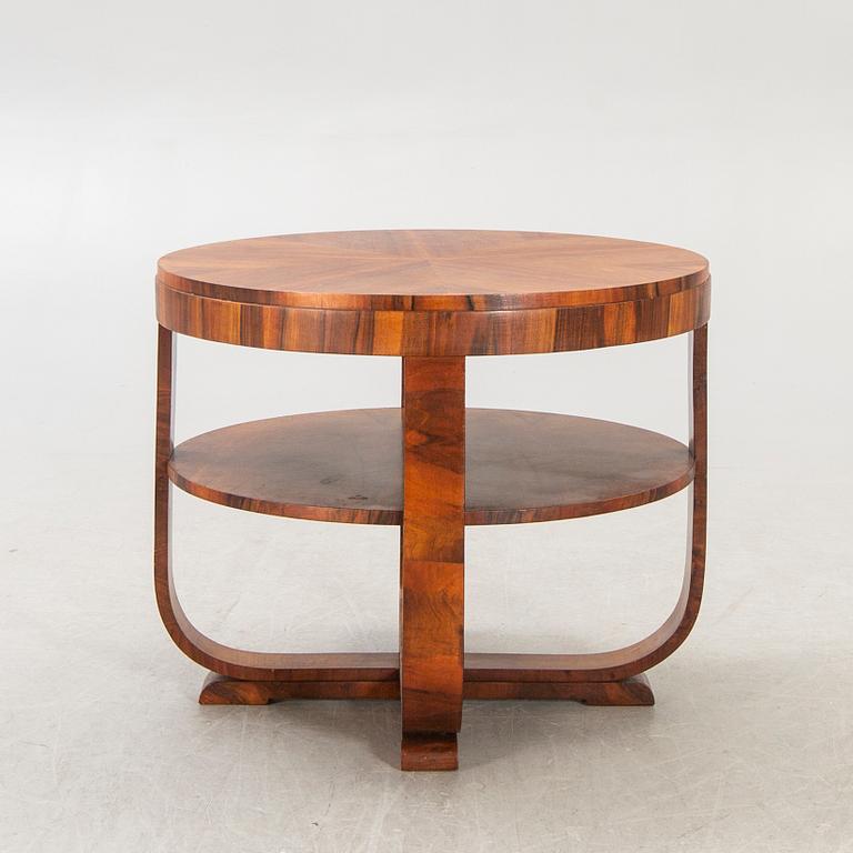 A modern Art Deco style walnut coffee table.