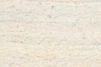 A sheepskin rug. Ca. 140 x 200 cm.