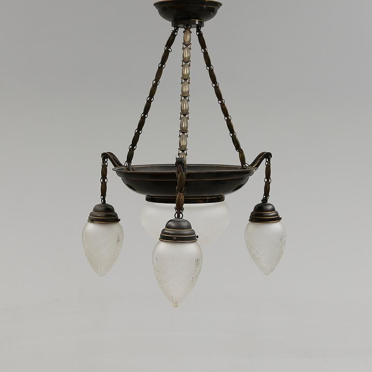 TAKLAMPA, 1900-talets första hälft.