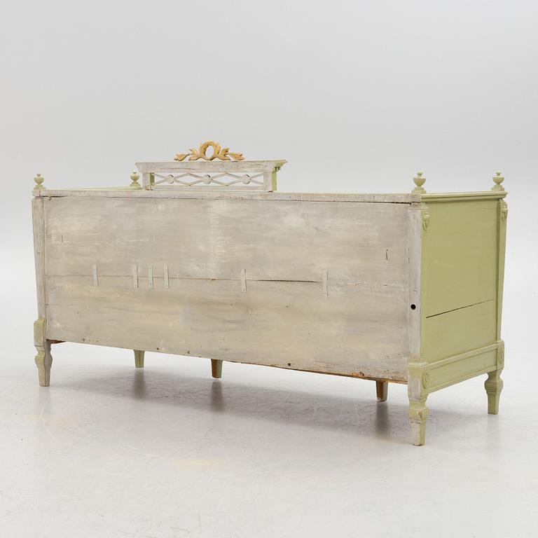 A Gustavian style sofa, circa 1900.