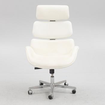 A contemporary swivel chair, Roche Bobois.