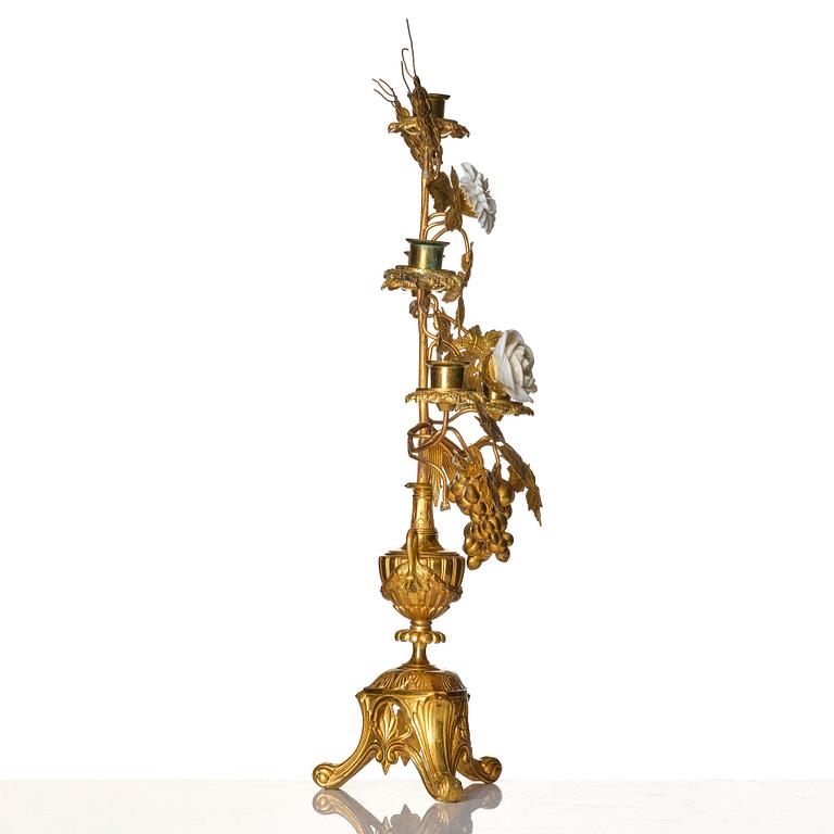 A contemporary five candle candelabrum.