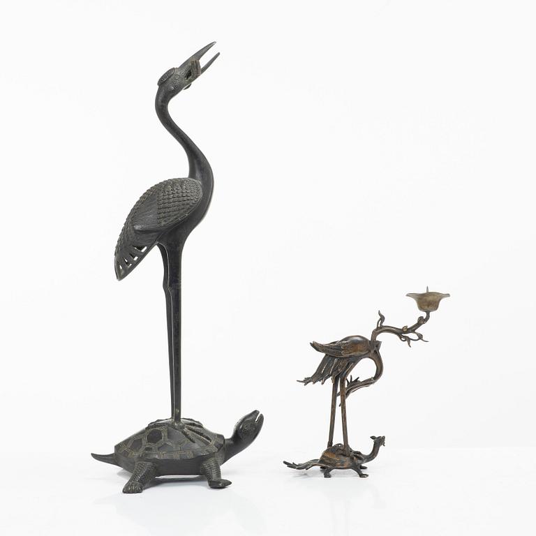 Two bronze sculptures/candle holders, Japan & China, 20th century.