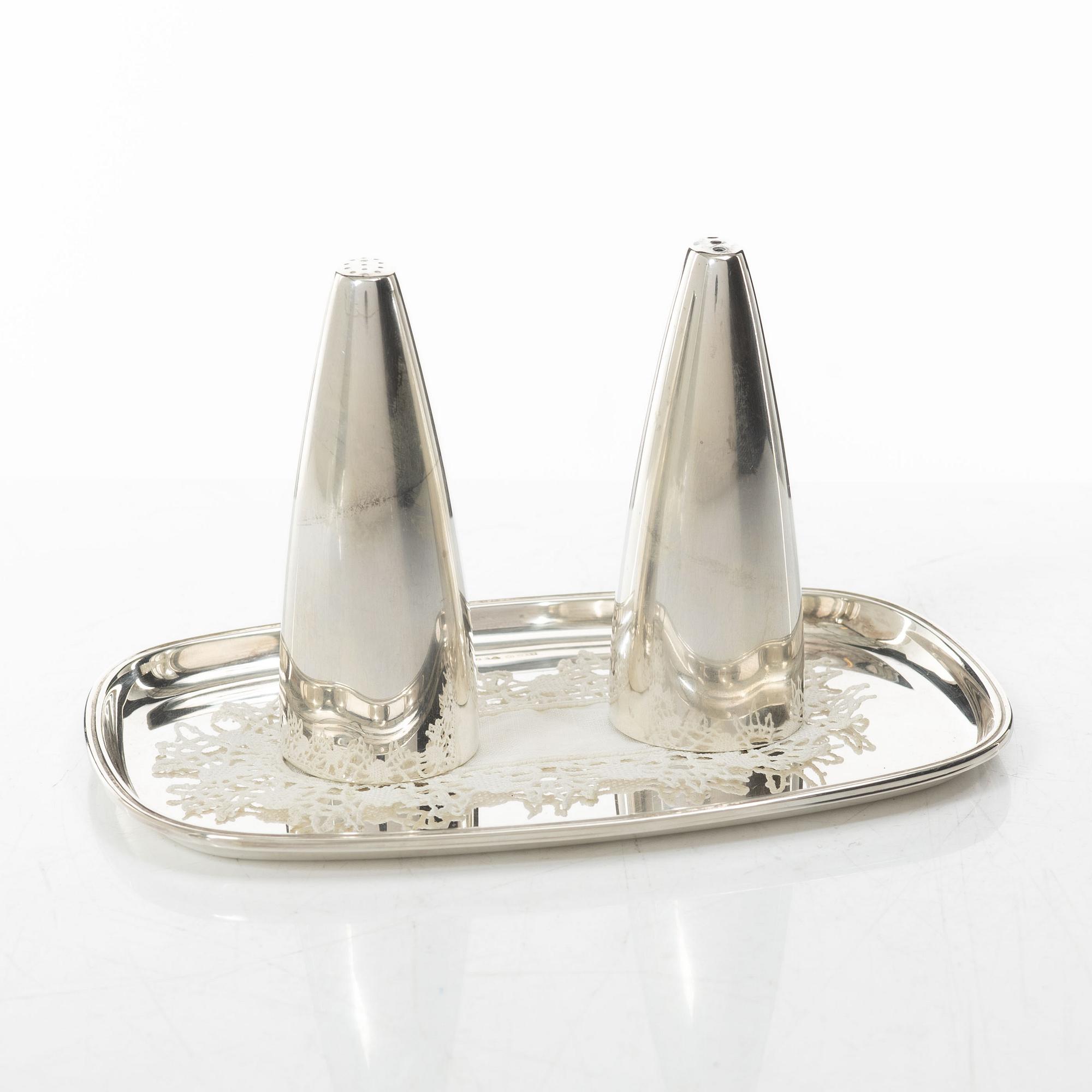 Salt and pepper shakers and tray, silver, including Henning Koppel for Georg Jensen, Denmark.