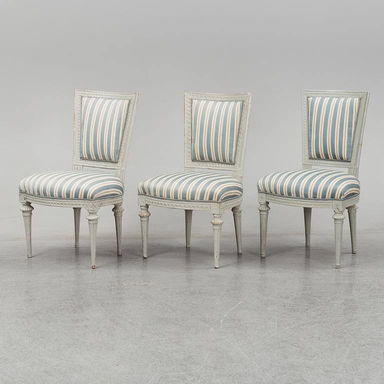 Six (3+2+1) late 18th century Gustavian chairs.