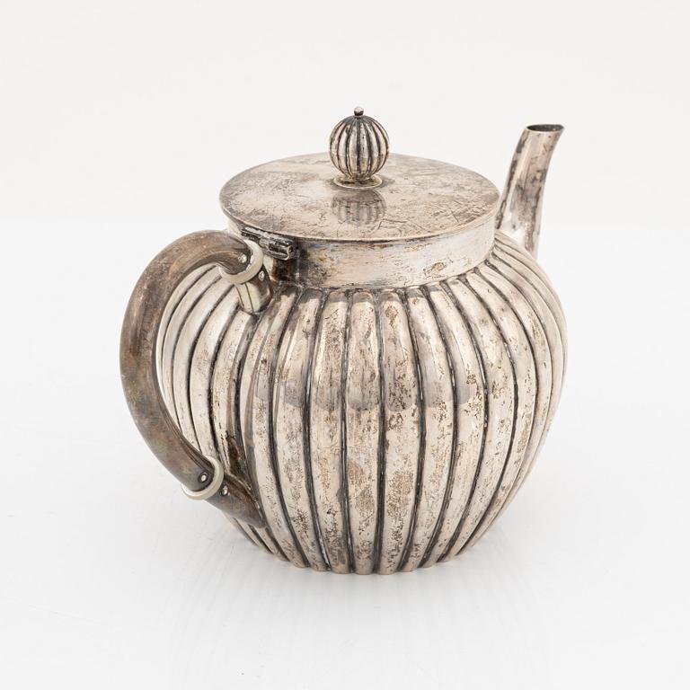 A silver teapot, bearing the mark of K. Andersson, Stcokholm, 1905.