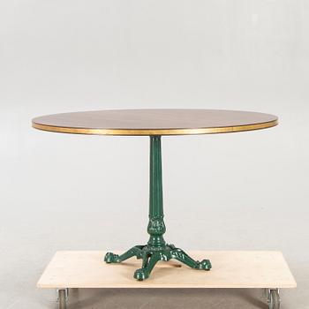 Table, cast iron base, 20th century.