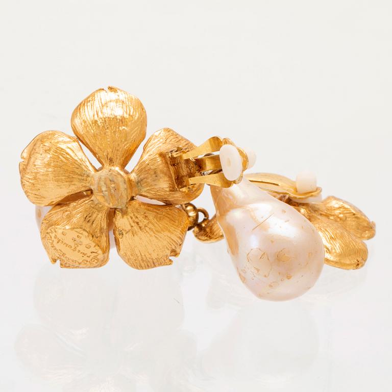 A pair of earrings by Yves Saint Laurent.