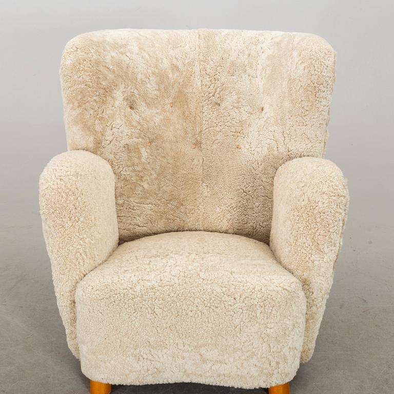 A DANISH SHEEPSKIN ARMCHAIR, 1940-50's.