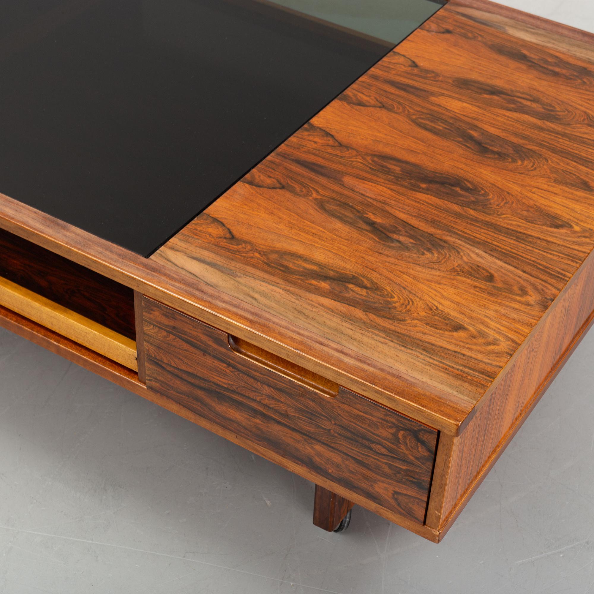 Torbjørn Afdal, a rosewodd veneered coffee table, Haug Snekkeri A/S, Bruksbo, Norway, 1960's/70's.