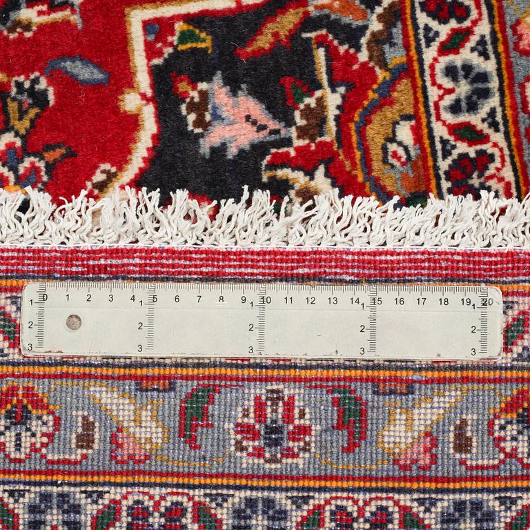 A Keshan rug, 345 x 236 cm.