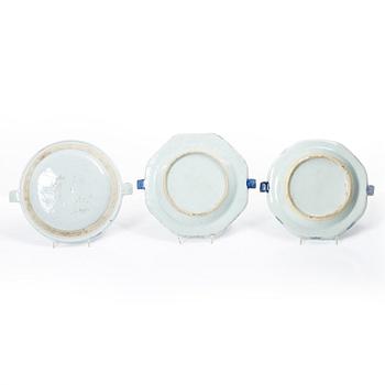 A group of three Chinese blue and white porcelain hot water dishes, Qing dynasty, 18/19th century.