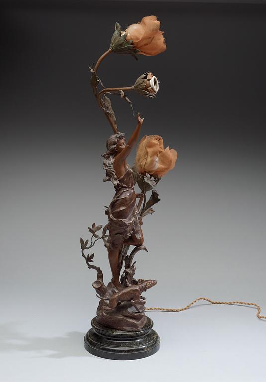 An Art Noveau zink table lamp, ca 1900.