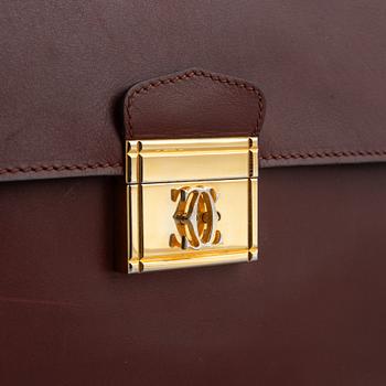 Cartier, a briefcase.