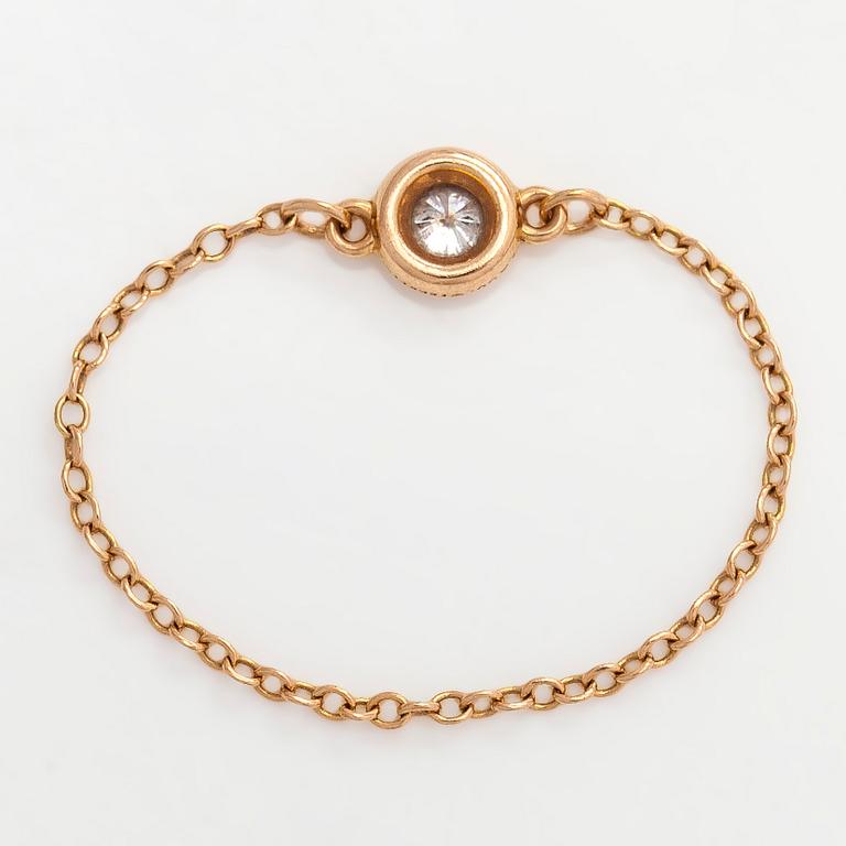 Tiffany & Co, Elsa Peretti, an 18K gold 'Diamonds by The Yard' ring with a brilliant-cut diamond.