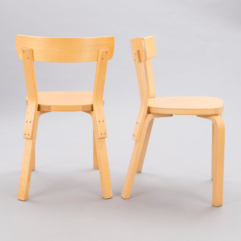 A Set of Three model 69 Chairs by Artek, late 20th Century.