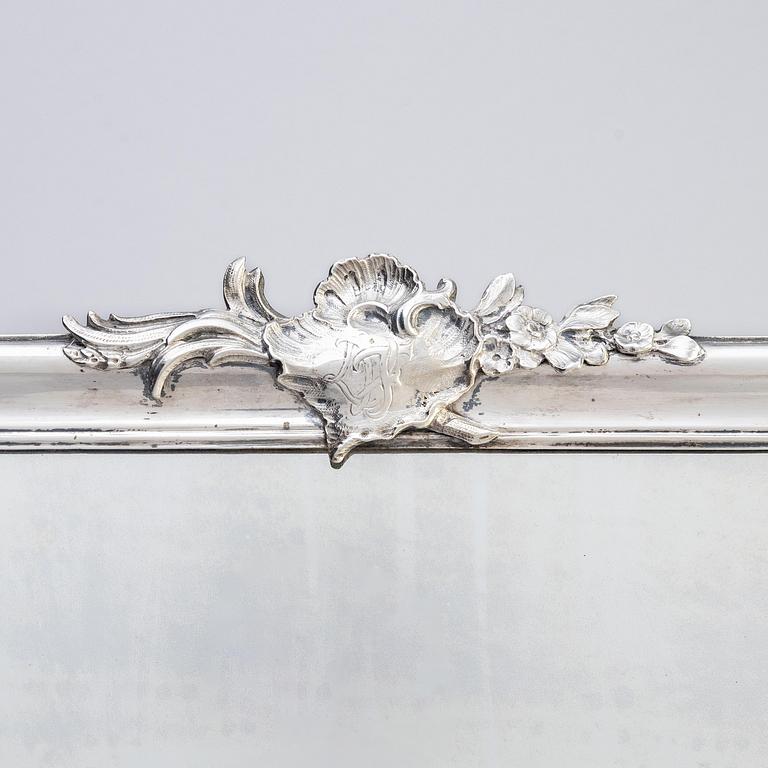 A Swedish Rococo mid-18th century mirror with silver frame  signed by Christian Precht.