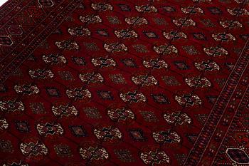 An old Turkmen carpet, c. 235 x 175 cm.
