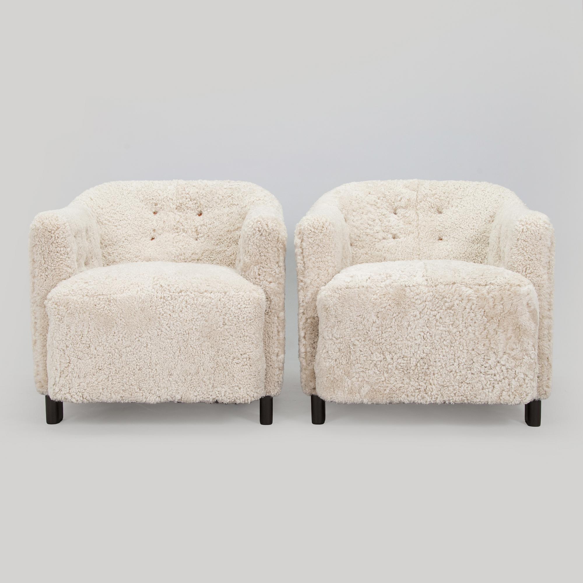 A pair of  1930s/40s. 'Continent' armchairs model 217, Asko, Finland.