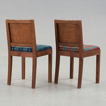 Axel Einar Hjorth, A pair of Axel Einar Hjorth pine 'Wärmdö' chairs, Nordiska Kompaniet, Sweden ca 1935.