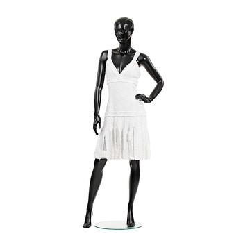 402. CHANEL, a white bouclé dress, 2004.