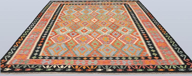 A Kilim carpet, approx. 301 x 257 cm.